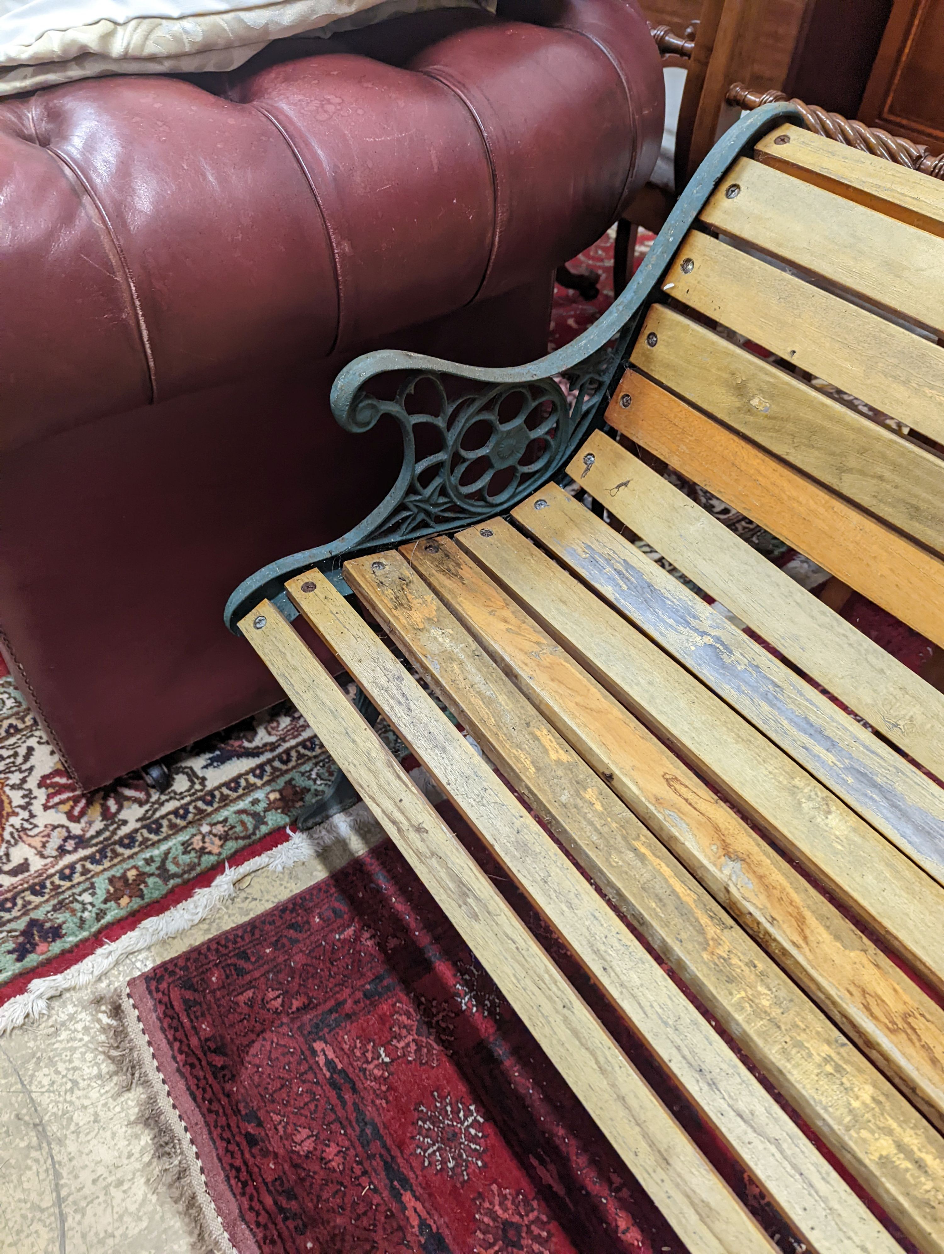 A Victorian style painted aluminium slatted garden bench, length 127cm, depth 55cm, height 67cm
